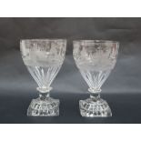 A pair of continental glass rummers the tapering bowl decorated with hunting scenes,
