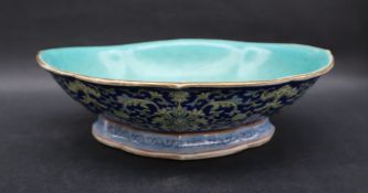 A Chinese porcelain bowl, with a turquoise interior,