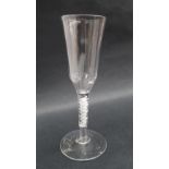 A 19th century wine glass with a tall tapering bowl and double helix cotton twist stem on a