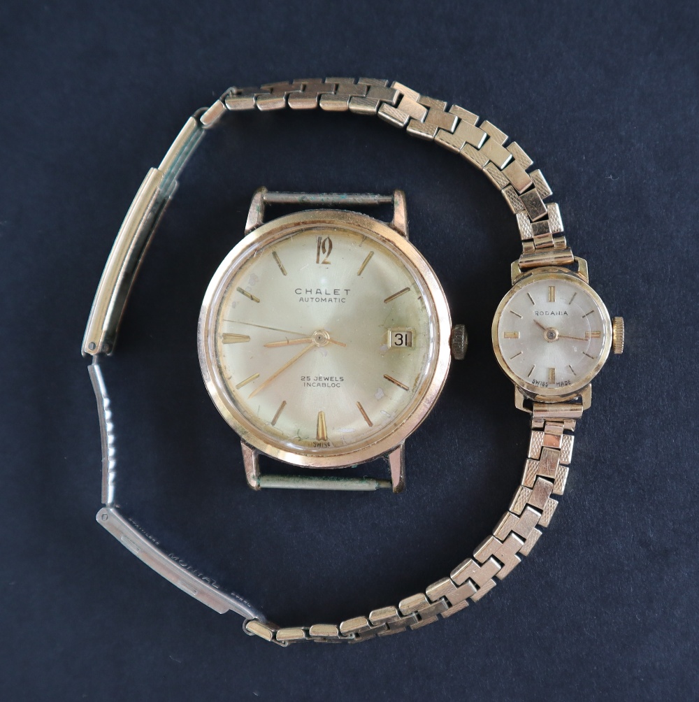 A lady's 9ct gold Rodania wristwatch with a circular dial and batons on a rolled gold bracelet