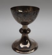 A George VI silver chalice, with a circular bowl and knopped stem on a spreading foot, Birmingham,