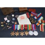 A set of six World War II medals including The 1939-1945 Star, The Atlantic Star,