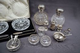 A George V silver topped scent bottle with an embossed globe top, Birmingham,