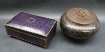 A cloisonne enamel cigarette box, with scale decoration to a blue ground on four bun feet, 15.