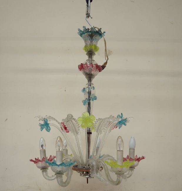 A Murano glass six branch chandelier with daffodil type flower heads and glass leaves radiating,