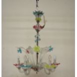 A Murano glass six branch chandelier with daffodil type flower heads and glass leaves radiating,