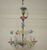 A Murano glass six branch chandelier with daffodil type flower heads and glass leaves radiating,