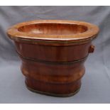 A Chinese wooden baby bath having removable interior,