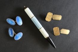 A two tone blue enamel propelling pencil together with a pair of blue enamel on silver cufflinks