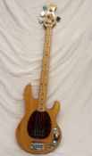 An OLP four string bass guitar, licensed by Ernie Ball, S/No.