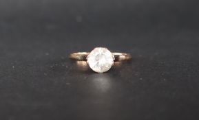 A 9ct yellow gold dress ring, set with a faux diamond,