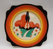 A Clarice Cliff sandwich plate decorated in the Farmhouse pattern with an orange roofed farmhouse