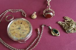 A 9ct gold open faced pocket watch, the gilt dial with Roman numerals inscribed E Harris & Co,