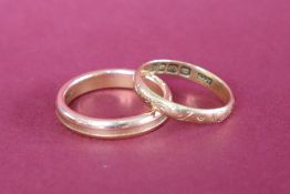Two 18ct yellow gold wedding bands size O and L, approximately 7.
