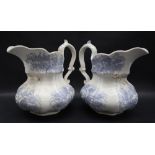 A pair of 19th century pottery jugs, decorated ion the blue fern pattern,