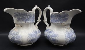 A pair of 19th century pottery jugs, decorated ion the blue fern pattern,