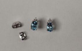 A pair of Aquamarine and diamond drop earrings,