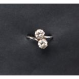 An 18ct gold two stone diamond ring,