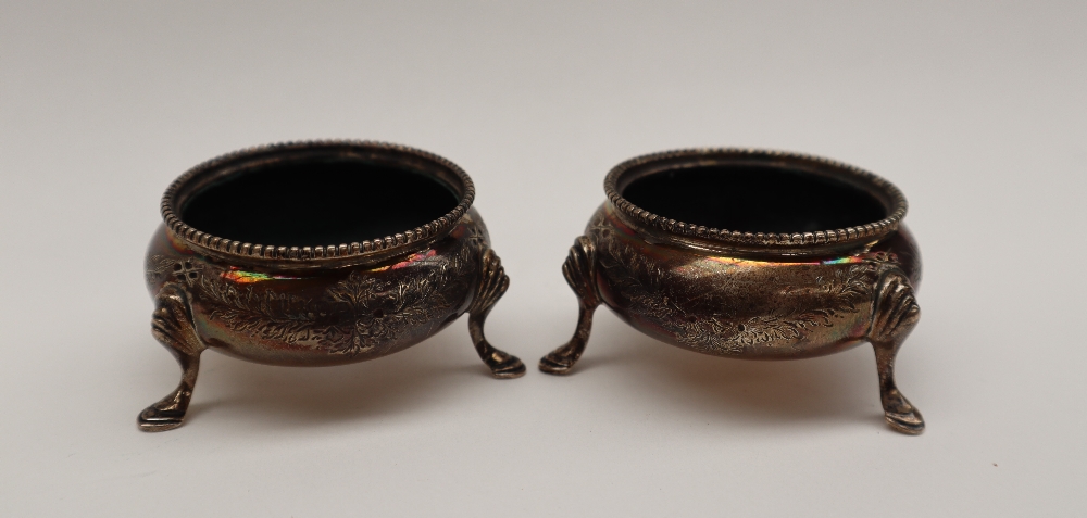 A pair of Victorian silver cauldron salts, with swag decoration on three legs, London, 1881 & 1882, - Image 2 of 2