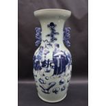 A Chinese twin handled porcelain twin handled vase,