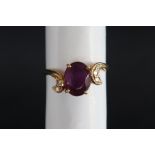 An 18ct gold amethyst and diamond dress ring,