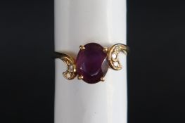An 18ct gold amethyst and diamond dress ring,