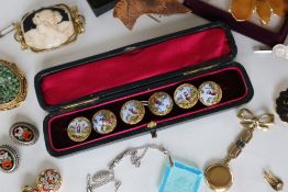 A set of six 19th century French enamel decorated shirt studs,