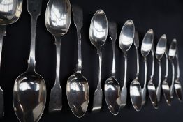 A set of eight fiddle pattern dessert spoons, London, 1875, Goldsmiths Alliance Ltd,
