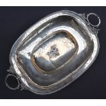 A Continental white metal twin handled bowl of oval form on pierced feet, 37.
