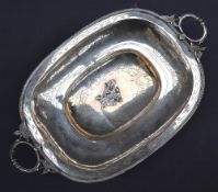A Continental white metal twin handled bowl of oval form on pierced feet, 37.