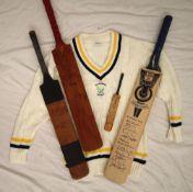 A Hunts County Bats cricket bat signed by the Glamorgan 2002 team,
