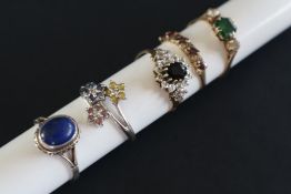 Three 9ct yellow gold dress rings set with semi precious stones together with a white metal dress