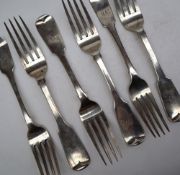 A set of four George IV Irish silver fiddle pattern table forks, Dublin, 1826, William Cummins,