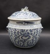 A Chinese porcelain pot and cover, the domed lid with lion dog finial,
