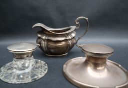 An Edward VII silver cream jug of oval form, London,