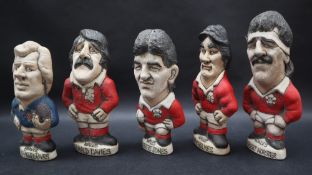 Five John Hughes pottery Groggs including Robert Jones in Welsh Kit and number 9 to the reverse,