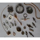 A silver open faced pocket watch, together with a compass, loose opals, a momento mori pendant,