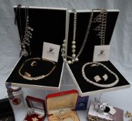 Assorted costume jewellery including Swarovski necklace and earring sets, brooches, necklaces,