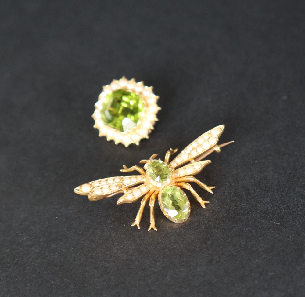 A 15ct gold peridot and seed pearl brooch in the form of an insect, approximately 4.