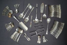 A late Victorian extensive Kings pattern silver flatware service comprising twelve table spoons,
