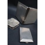 A George V silver cigarette case of square form, with engine turned decoration, London, 1939,