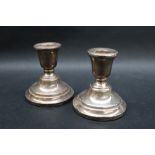 A pair of Elizabeth II silver desk candlesticks, Birmingham, 1963, 8.