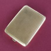 A 9ct yellow gold match book case, of rectangular form with engine turned decoration, 60mm x 46mm,