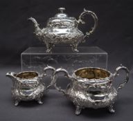 A Victorian silver three piece tea service comprising a teapot,
