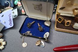 A pair of silver and black enamel Masonic cufflinks together with a collection of costume jewellery