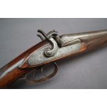 A 19th century double barrel percussion shotgun, the side plates inscribed Thos Bolton,