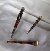 A Scottish hardstone and white metal mounted brooch in the form of dirk,