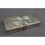 A George V silver trinket box of rectangular form, embossed with angels, London, 1905,
