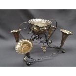 A George V silver epergne, with a central flared bowl and four trumpets on a naturalistic,