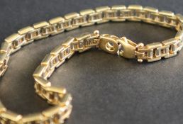 A 9ct gold bracelet , with rectangular links and a lobster clasp, 19cm long,